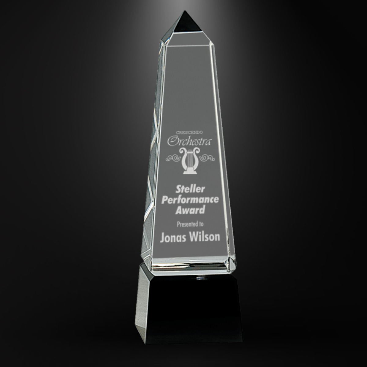 Obelisk Crystal on Black Pedestal Base